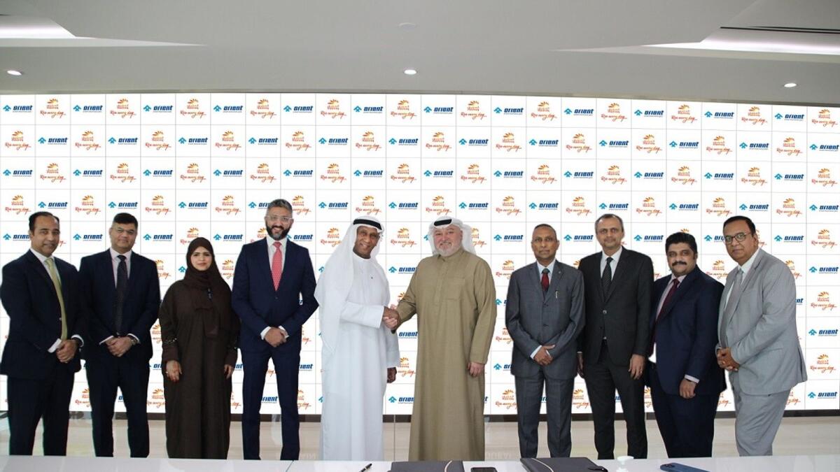 Omer Elamin, president of Orient Insurance Group; executive vice-president and head of Mashreq Gold, Aladdin AL Deesi; and other top executives at the event. — Supplied photo