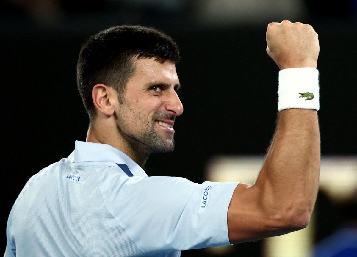 Serbia's Novak Djokovic celebrates after winning his fourth round match against France's Adrian Mannarino. — Reuters
