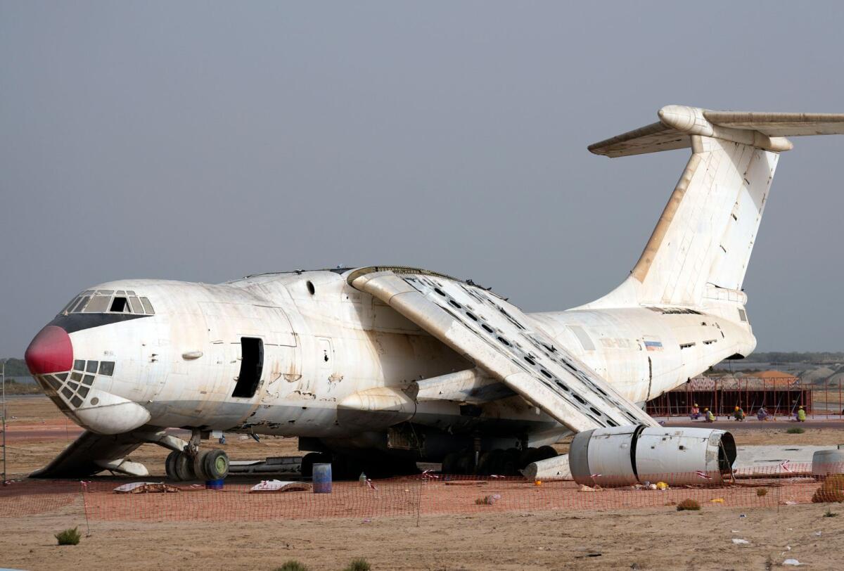 FILE. The abandoned Ilyushin Il-76 plane being dismantled at the old airfield of Umm Al Quwain, United Arab Emirates, Friday, May 27, 2022. Photo: AP