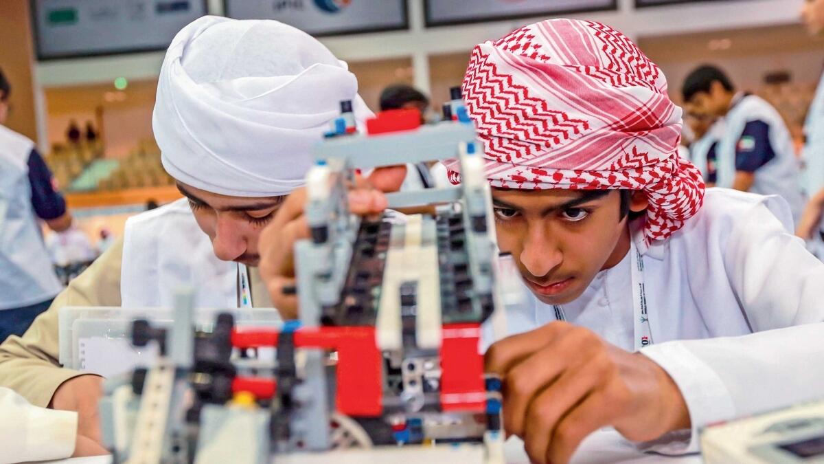 Students showcase their skills during the National Robot Olympiad in Abu Dhabi.— File photo
