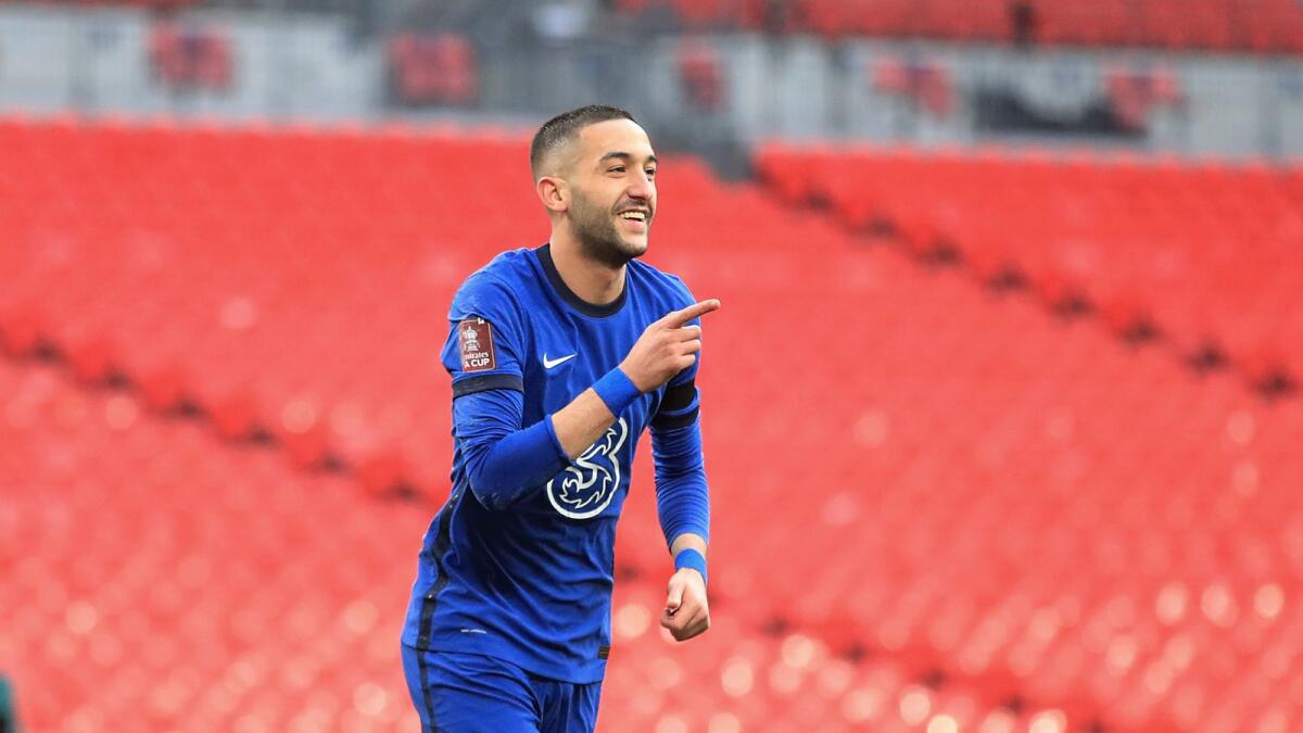 Chelsea's Hakim Ziyech celebrates after scoring a goal during the English FA Cup semifinal against Manchester City. — AP