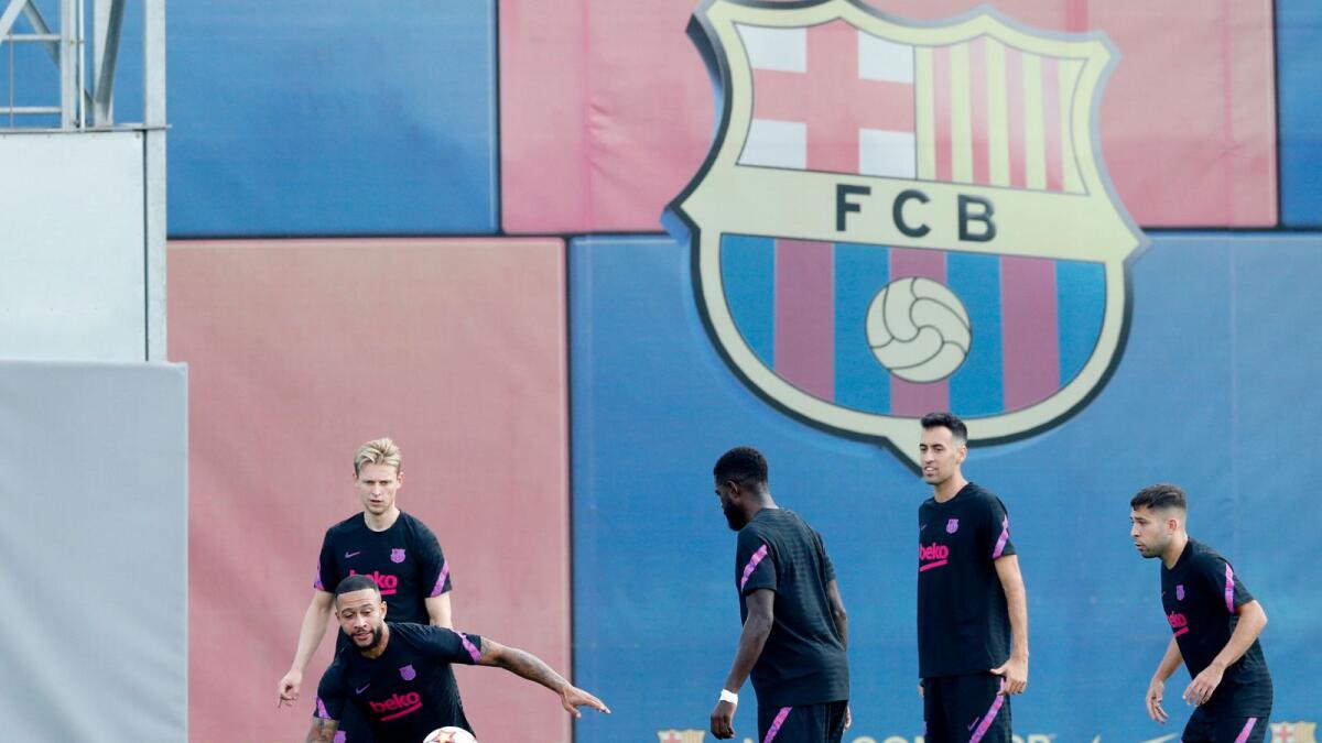 FC Barcelona's Frenkie de Jong, Memphis Depay, Samuel Umtiti, Sergio Busquets and Jordi Alba during a training session. — Reuters