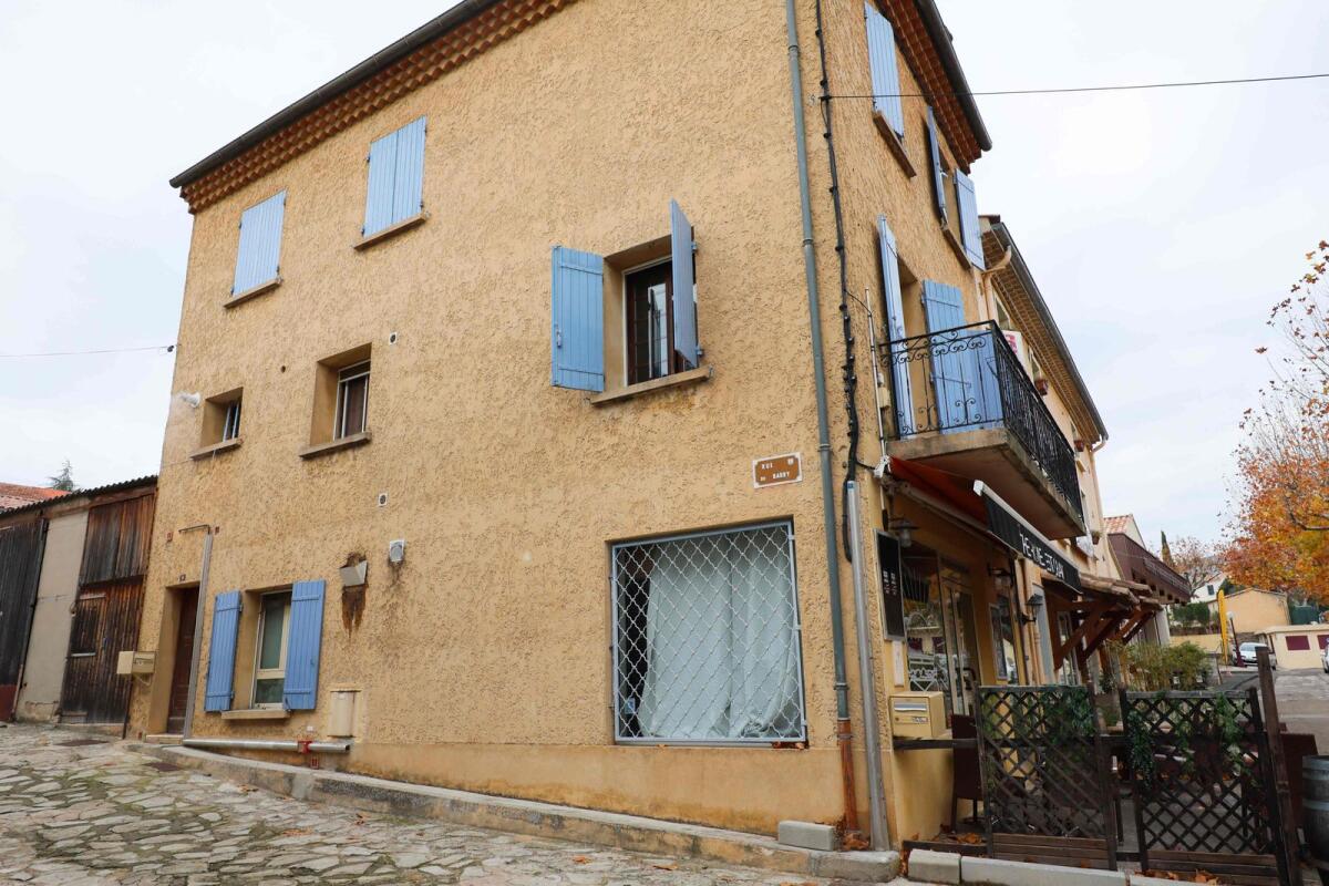 This photograph taken in Bedoin, southern France, on December 2, 2022, shows the building where the bodies of two newborns were found in a freezer on December 1, 2022. (Photo: AFP)