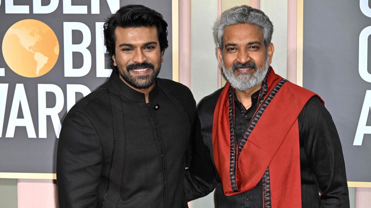 Indian actor Ram Charan and Indian film director S. S. Rajamouli arrive for the 80th annual Golden Globe Awards