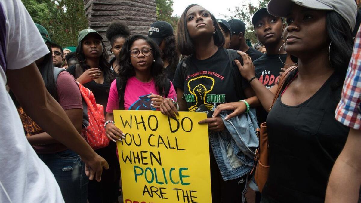 Students gather at the University of North Carolina in Charlotte, North Carolina, on September 21, 2016 for a protest against police brutality following the shooting of Keith Lamont Scott nearby the previous day.