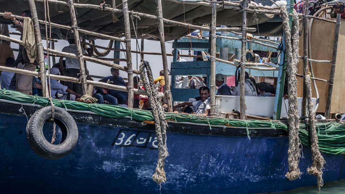 File phot shows refugees on a boat as they arrive in Djibouti. Photo: AFP