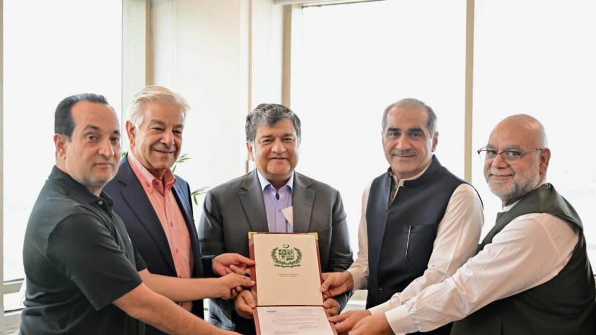 The airline senior management receiving the licence to operate on international routes from Federal Minister for Aviation Khawaja Saad Rafique and Defence Minister Khawaja Asif.