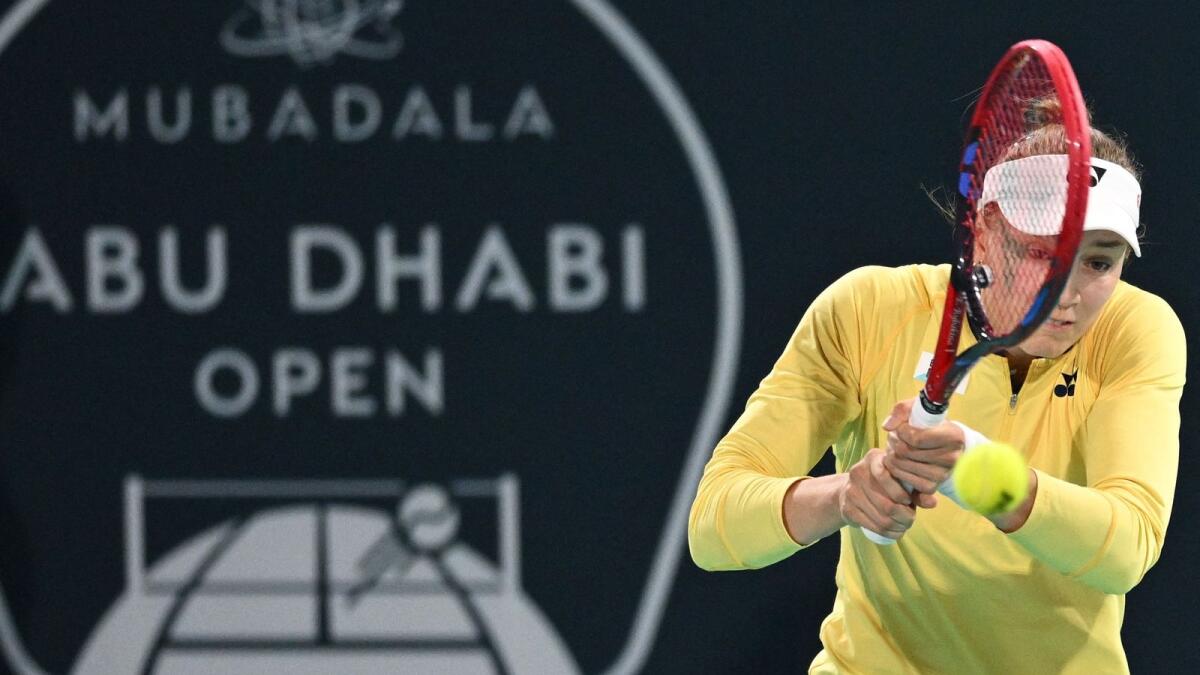 Elena Rybakina of Kazakhstan hits a return against Russia's Liudmila Samsonova during the women's singles semi-final match at the Mubadala Abu Dhabi Open. - AFP