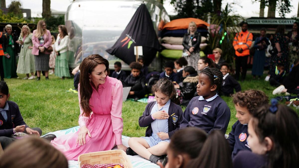 The Princess of Wales with pupils from schools taking part in the first Children's Picnic at the RHS Chelsea Flower Show at the Royal Hospital Chelsea, London on Monday. — Reuters