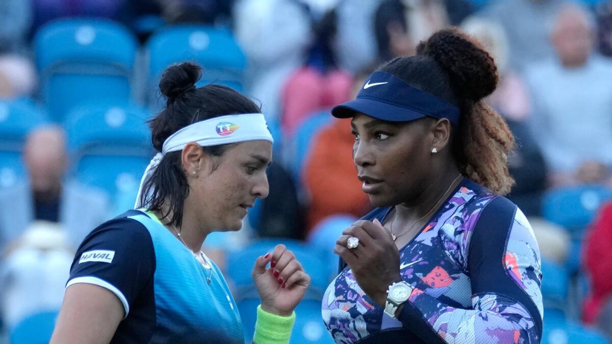 Serena Williams and Ons Jabeur before their match against Shuko Aoyama of Japan and Hao-Ching of Taiwan at the Eastbourne International on Wednesday. (AP)