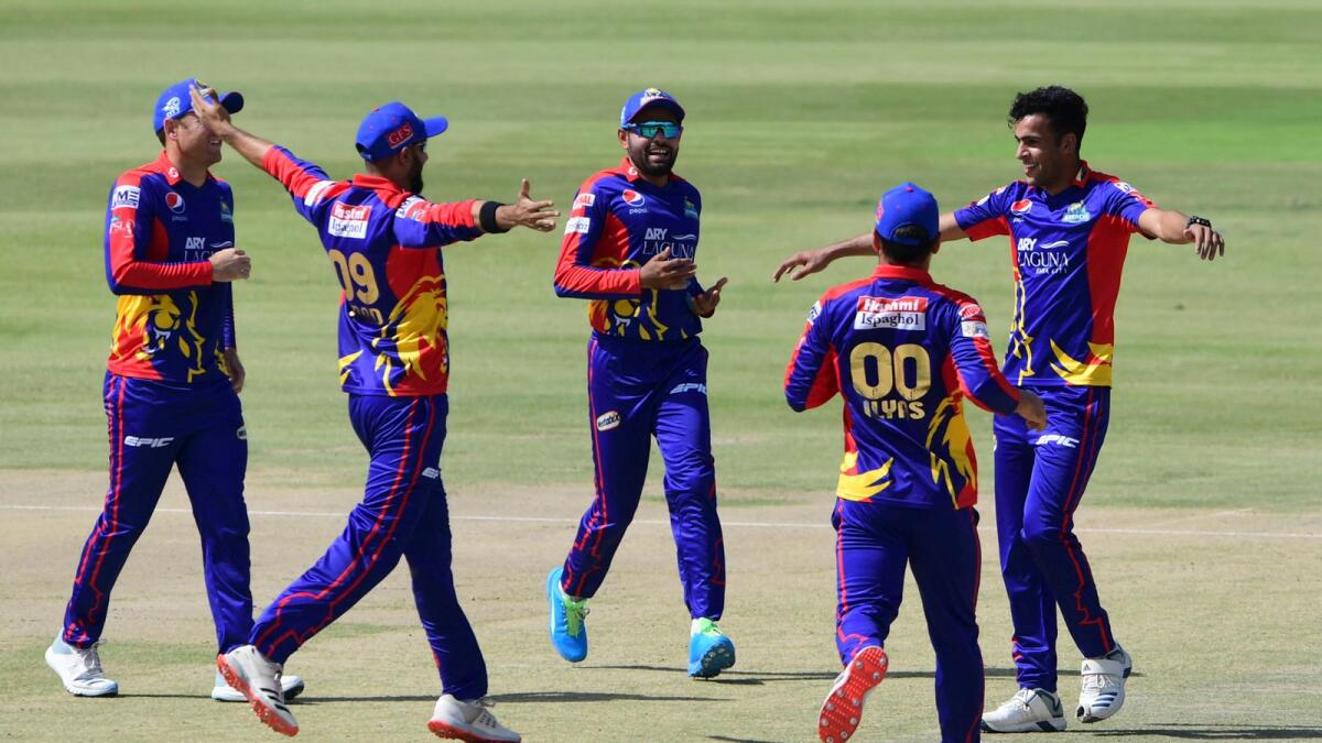 Karachi Kings players celebrate a wicket during their PSL match. (AFP file)