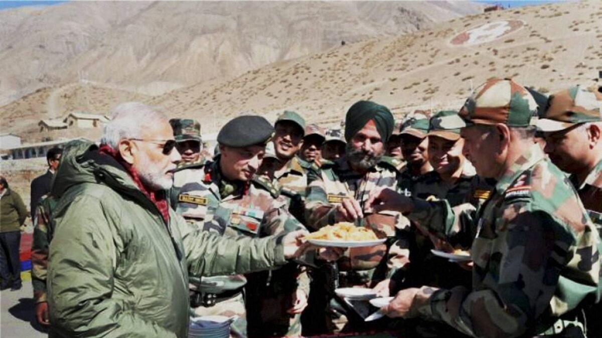 Modi shares Diwali sweets with soldiers near China border