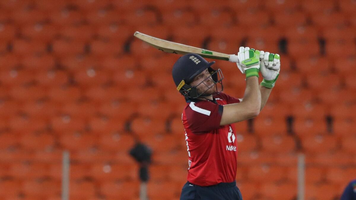 Jos Buttler plays a shot during the third T20 International against India. (BCCI)
