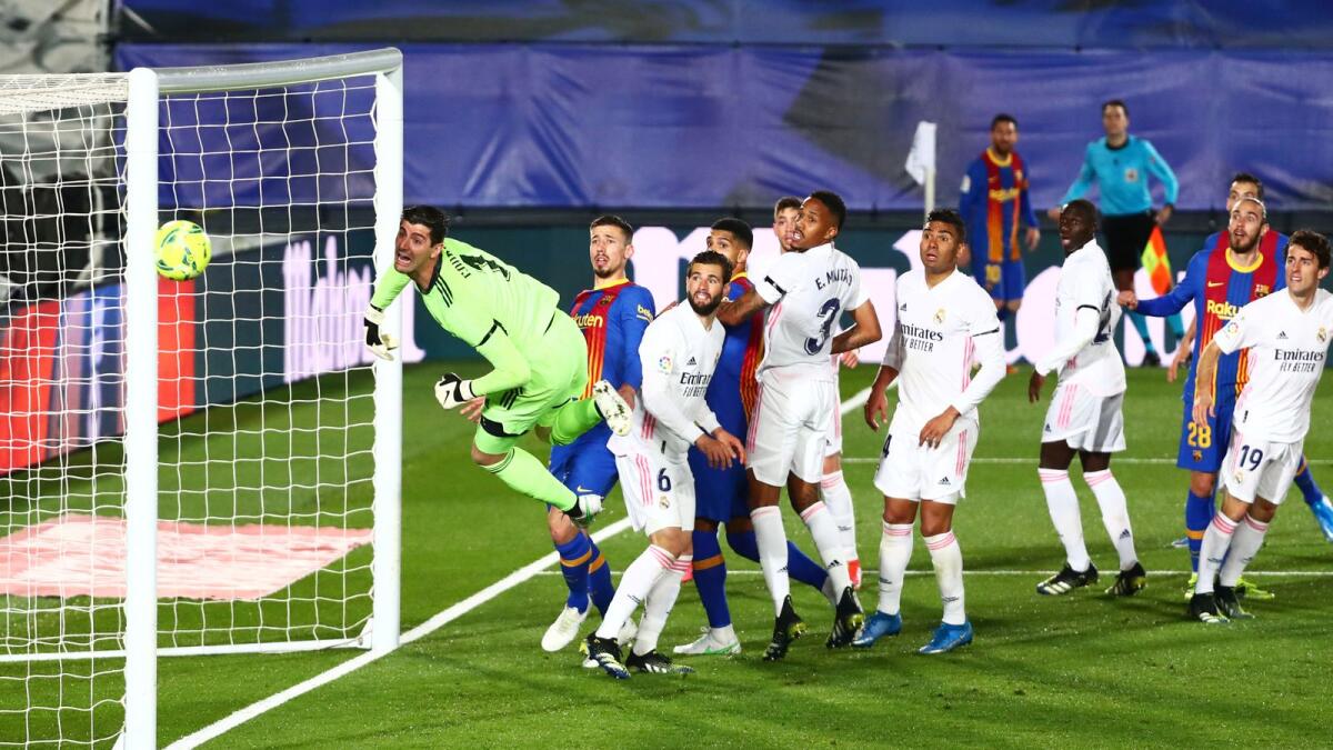 Barcelona's Lionel Messi (not pictured) shoots at goal from the corner. — Reuters
