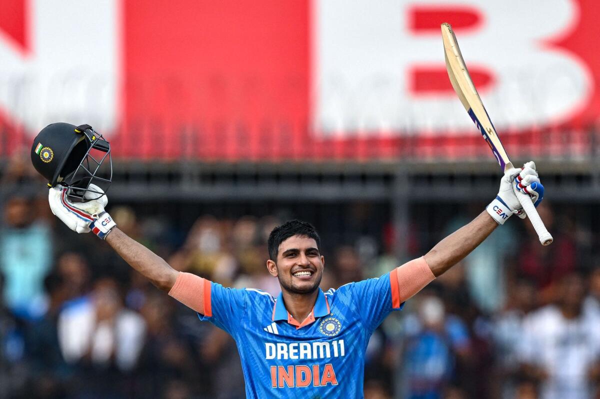 India's Shubman Gill celebrates after scoring a century. — AFP