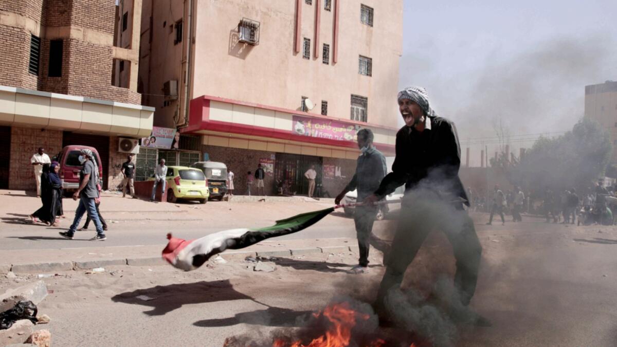 A man shouts during a protest in Khartoum, Sudan. — AP