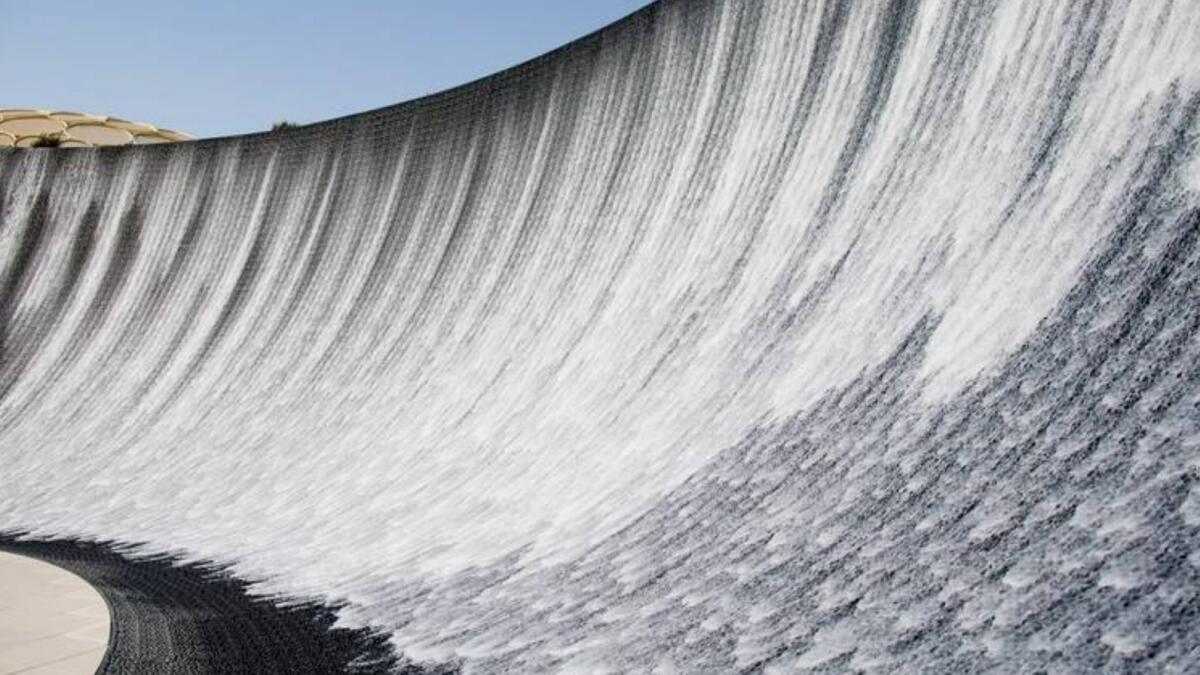 Giant sheets of water tumble down 13-metre-high vertical walls. Supplied photo