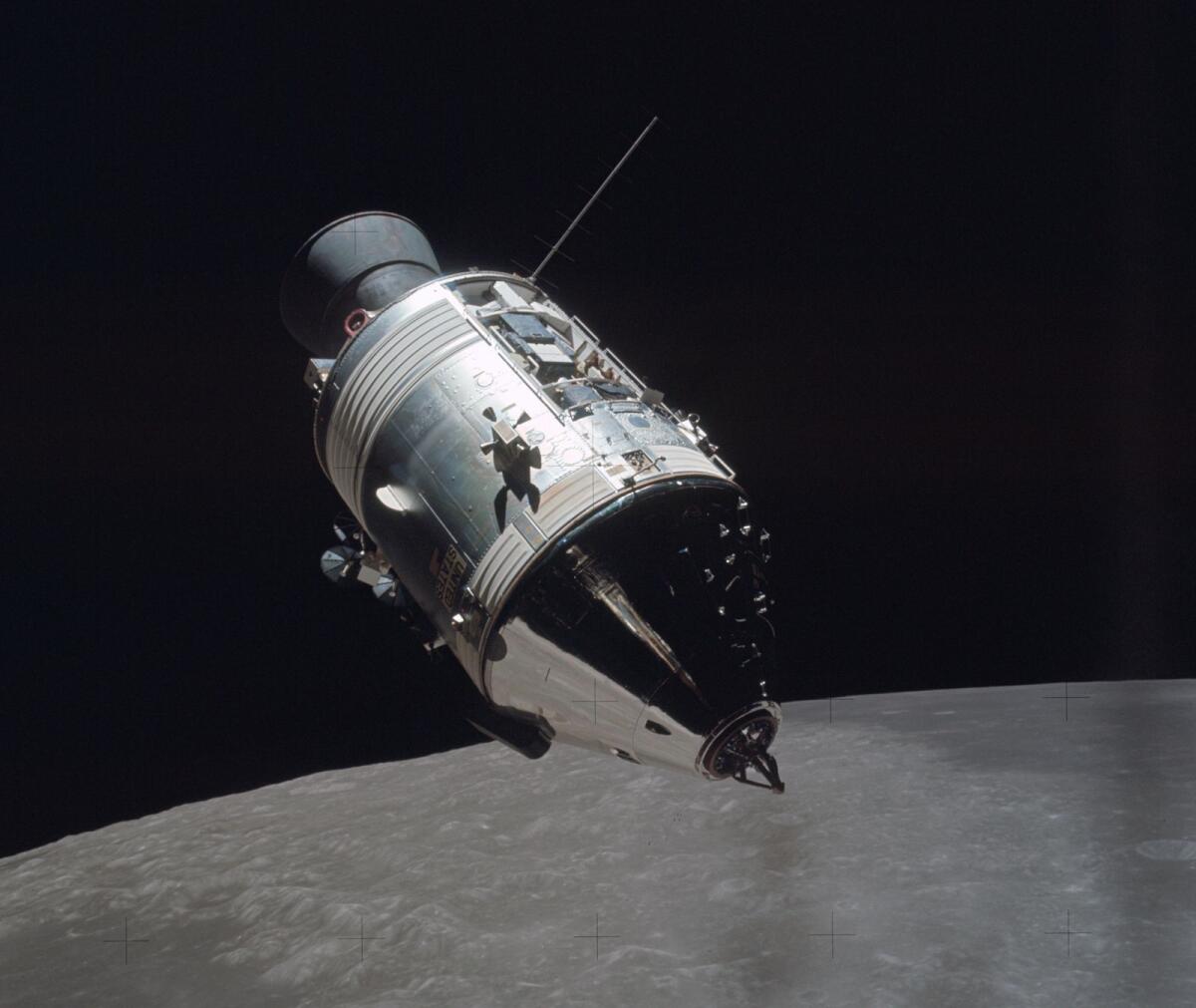 A photo provided by NASA shows the Apollo 17 command and service module in orbit around the moon on December 14, 1972. (NASA via The New York Times)
