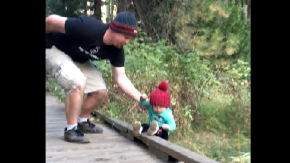 Video: Super dad saves baby from falling off the bridge
