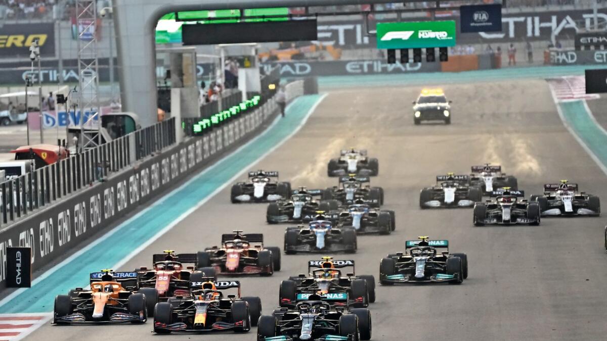 Mercedes driver Lewis Hamilton leads at the start of the Formula One Abu Dhabi Grand Prix on Sunday. — AP