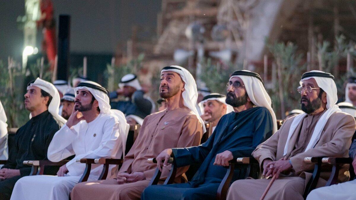 UAE leaders watch a display on the Al Wasl Plaza.