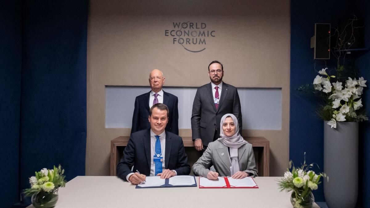 Mohammad bin Abdullah Al Gergawi, Klaus Schwab, Huda Al Hashimi, and Stephan Mergenthaler during the signing of partnership agreement at the World Economic Forum in Davos. — Supplied photo
