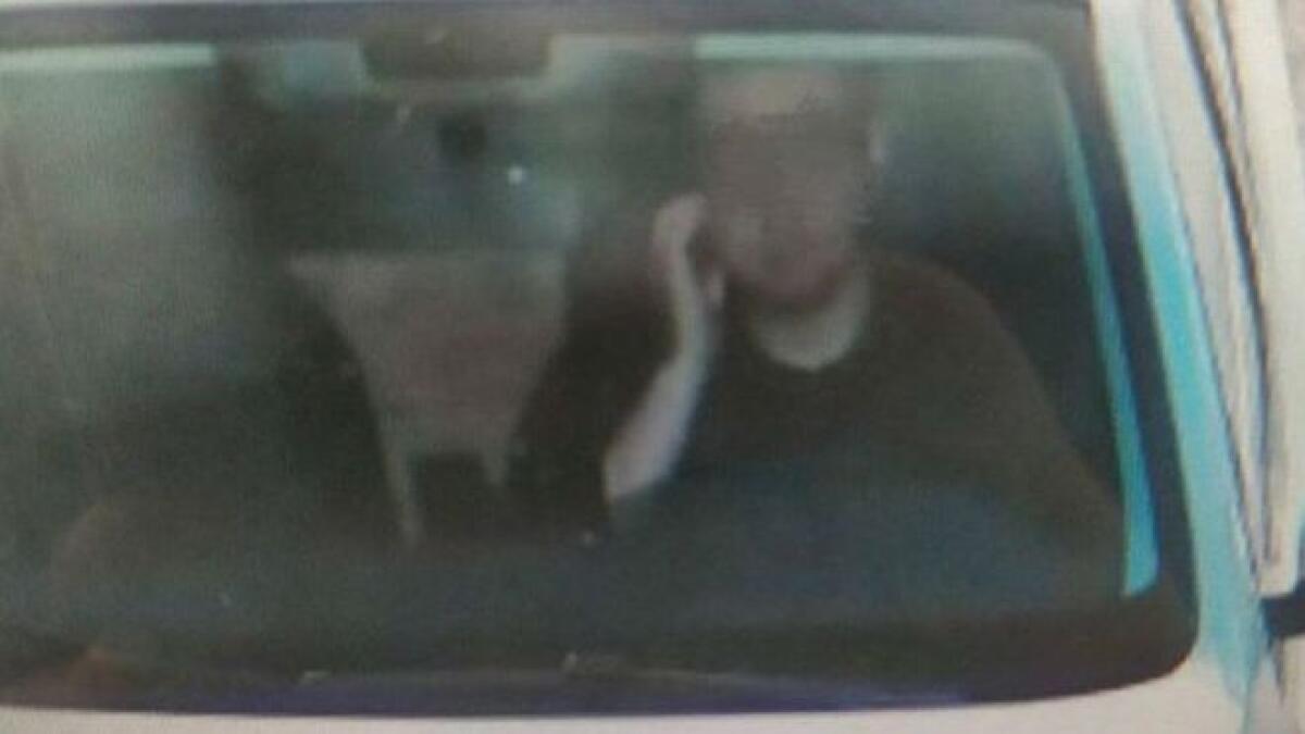 Motorist fined for scratching his face, picture goes viral
