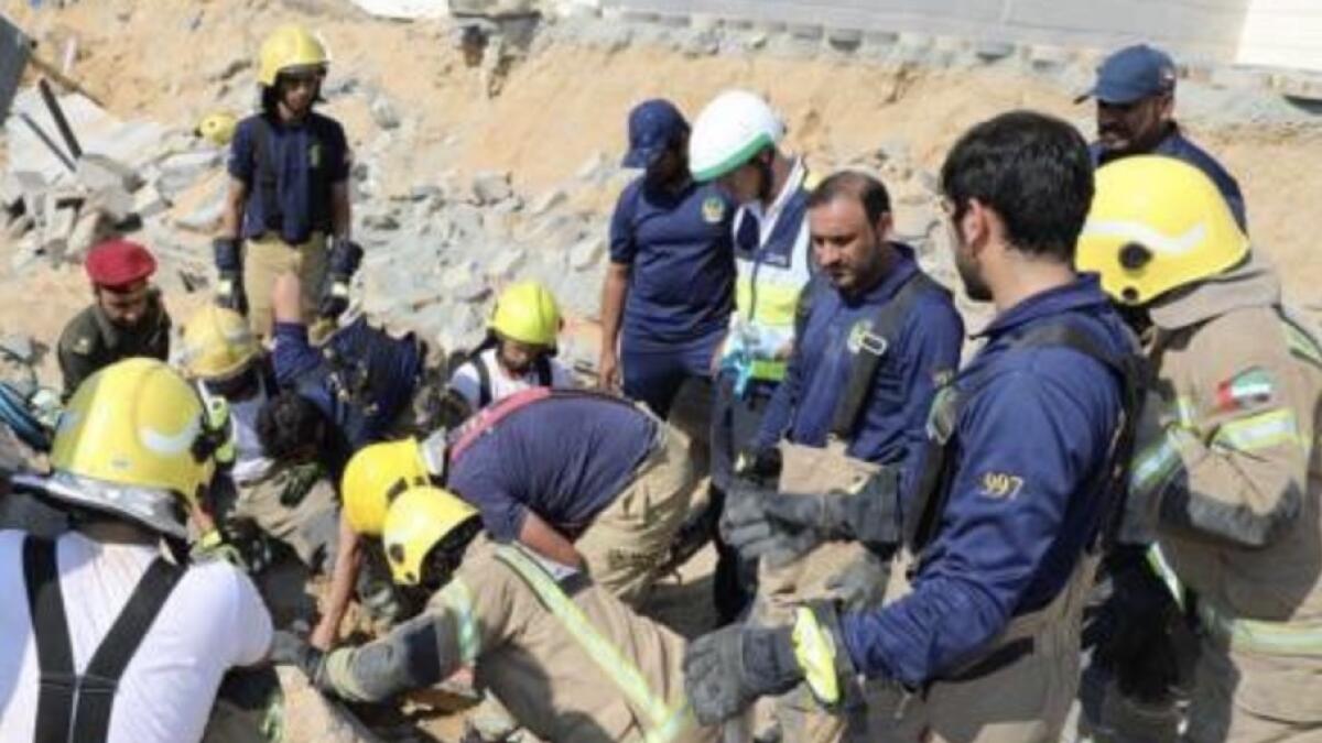 6 workers rescued after house wall collapses in Ajman