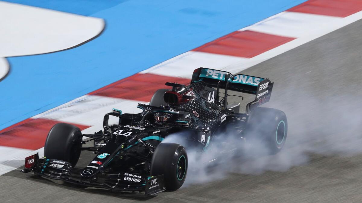 Mercedes driver Lewis Hamilton of Britain steers his car during the second free practice at the Formula One Bahrain International Circuit in Sakhir, Bahrain. AP
