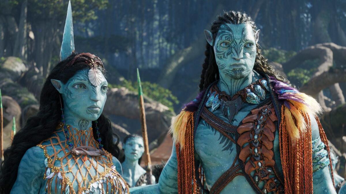 Ronal, voiced by Kate Winslet, left, and Tonowari, voiced by Cliff Curtis in a scene from Avatar: The Way of Water