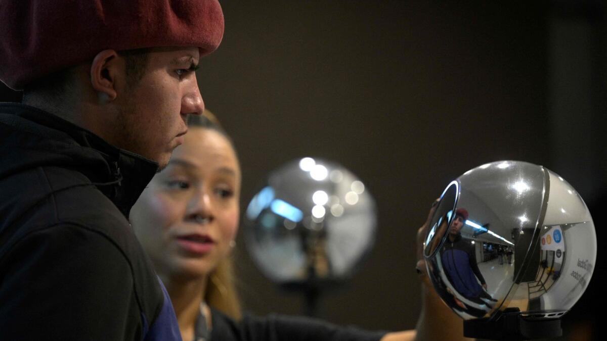 A man has his iris scanned with an orb, a biometric data scanning device, in exchange for the Worldcoin cryptocurrency in Buenos Aires. In recent months, hundreds of thousands have stood in front of a Worldcoin orb to scan the iris of their eyes in inflation-hit Argentina, where recent tightening delivered the coup de grace.— AFP