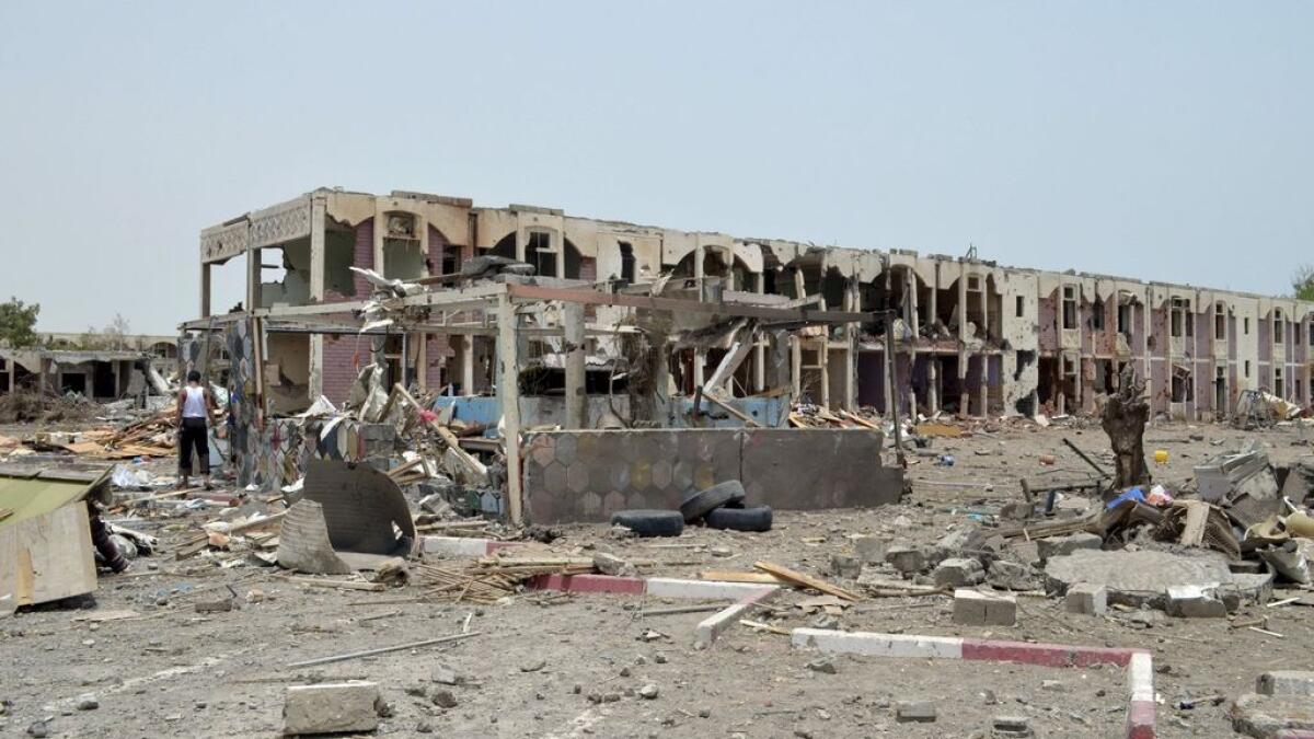 Damaged houses seen one day after a Saudi-led air strike hit them in Yemens western city of Mokha, July 26, 2015.