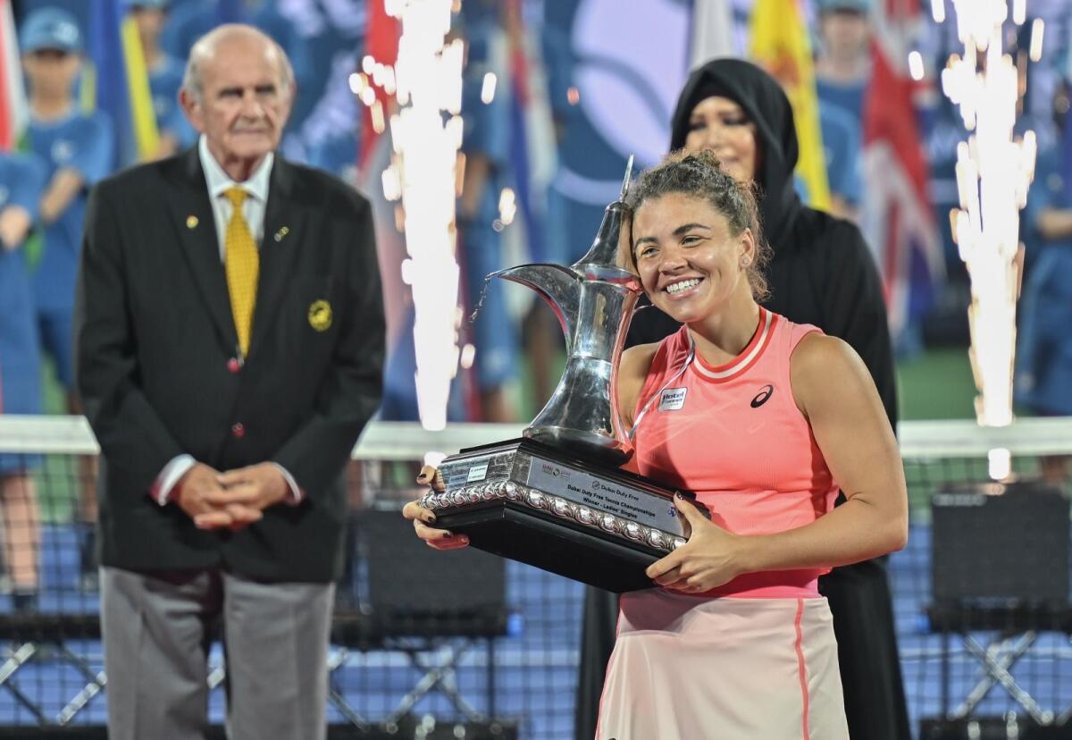 Jasmine Paolini smiles during the trophy ceremony at the Dubai Duty Free Tennis Championships. — Photo by Muhammad Sajjad