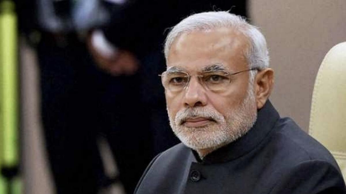 Indias PM Modi faces test as his home state votes