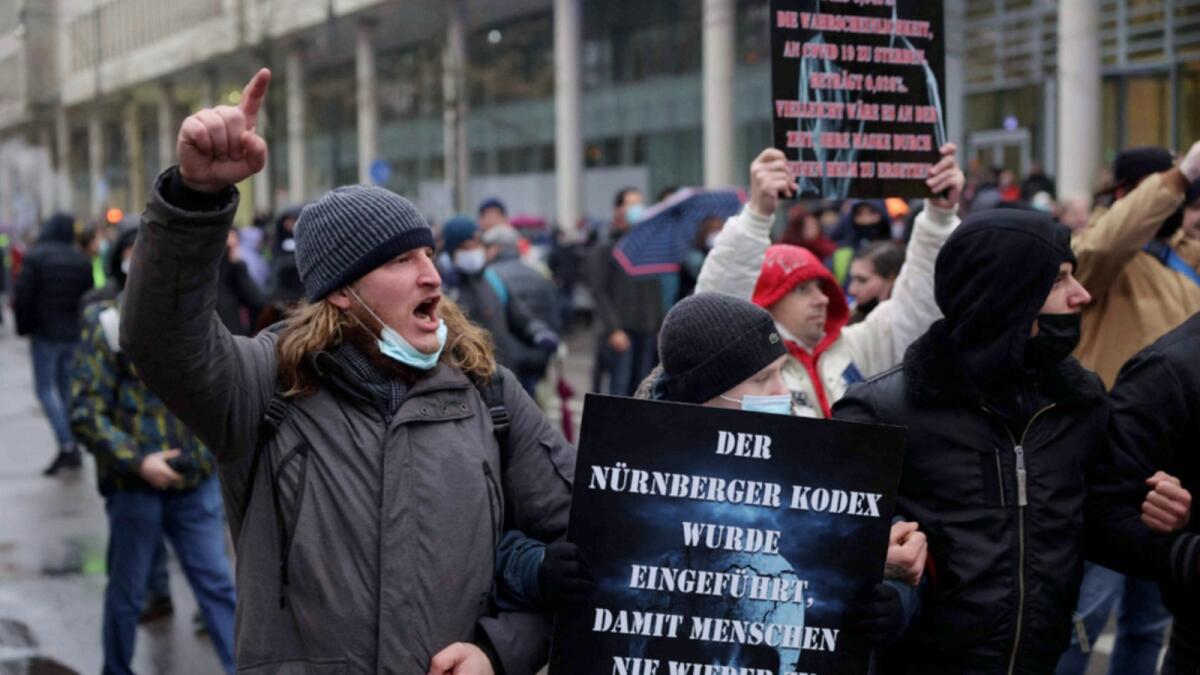 Protesters take part in a rally against Covid-19 restrictions and mandatory vaccination in Frankfurt am Main, western Germany. — AFP