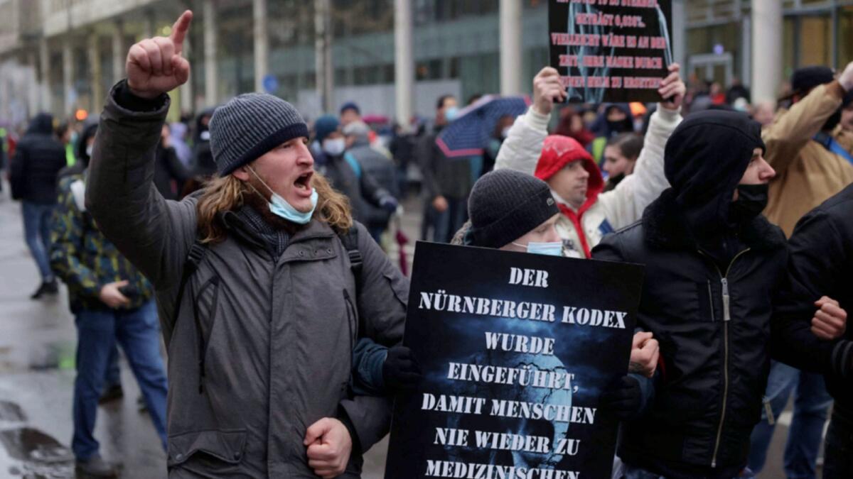 Protesters take part in a rally against Covid-19 restrictions and mandatory vaccination in Frankfurt am Main, western Germany. — AFP