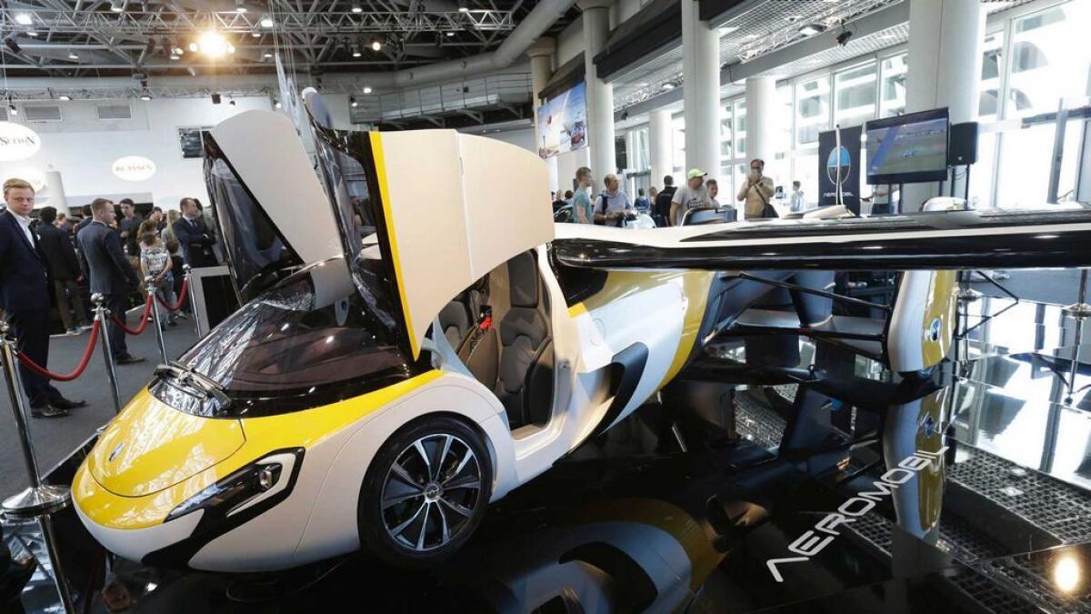 AeroMobil displaying its latest prototype of a flying car in Monaco. The light frame plane whose wings can fold back, like an insect is boosted by a rear propeller.- AP 