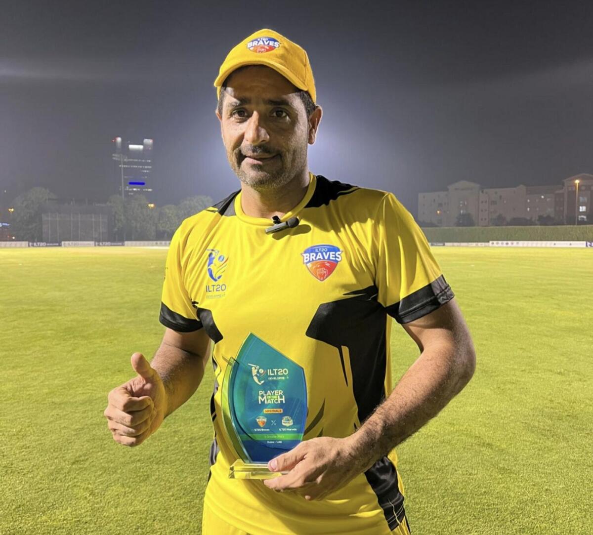 Asif Khan with a Player of the Match award during the ILT20 Development Tournament. - Khaleej Times