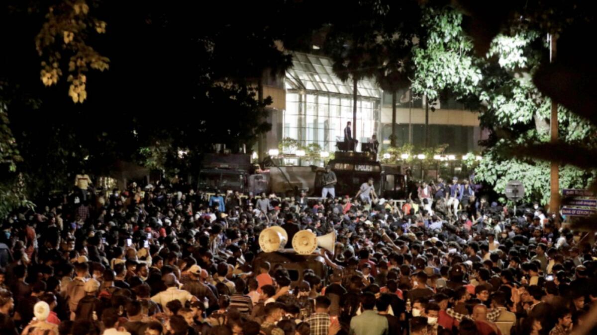 Demonstrators protest near President Gotabaya Rajapaksa's residence demanding his resignation. — Reuters
