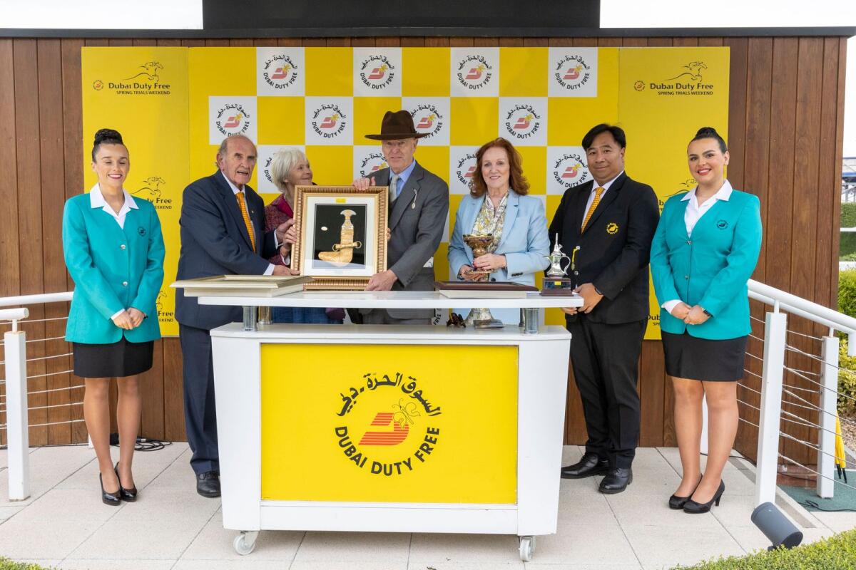Colm McLoughlin (second from left), Executive Vice Chairman and CEO, Dubai Duty Free’s; and Sinead El Sibai (third from right), Senior Vice-President, Marketing, Dubai Duty Free, at the presentation ceremony. — Supplied photo