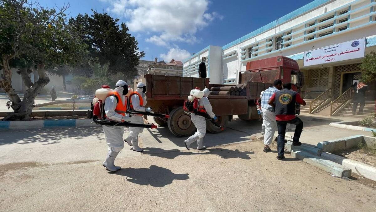 Volunteers disinfect the field hospital in the aftermath of the floods in Derna. — Reuters