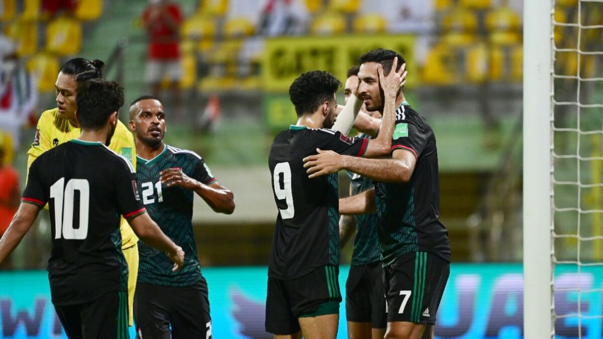 Ali Mabkhout (7) celebrates his goal with teammates during the match against Indonesia. (Photo by Shihab)