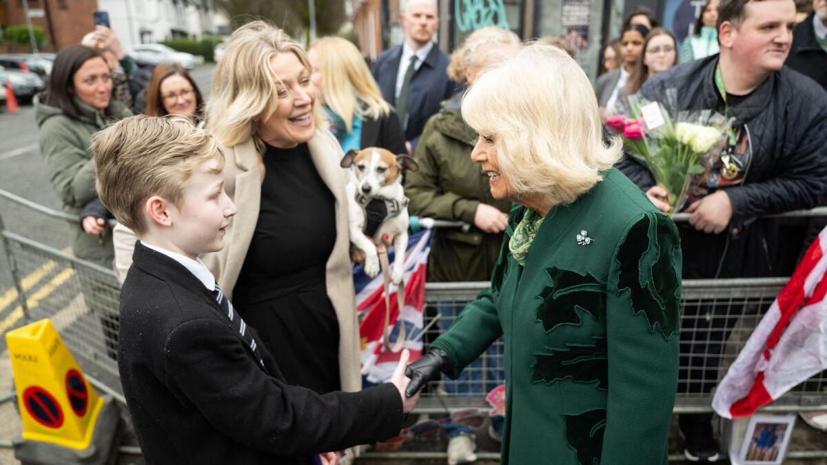 Britain's Queen Camilla meets wellwishers after visiting Knotts Bakery in Belfast. — AFP