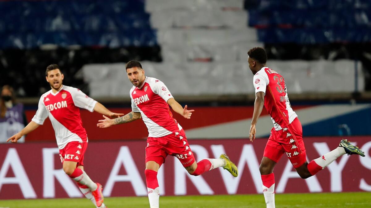Monaco's Guillermo Maripan (second left) celebrates after scores against PSG during the French League One match. — AP