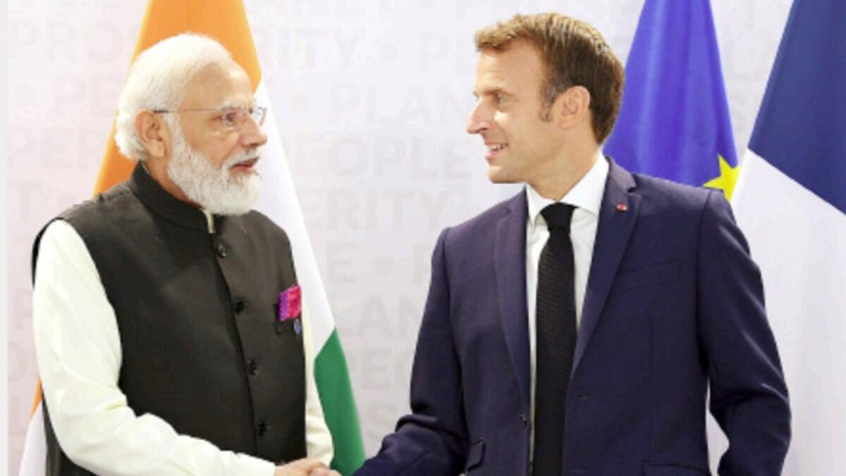 Indian Prime Minister Narendra Modi meets French President Emmanuel Macron on the sidelines of the G20 Summit, in Rome. — ANI