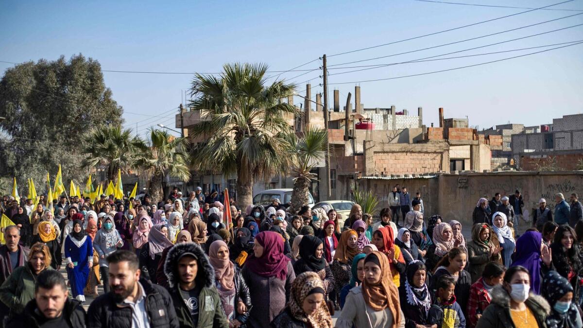 Hundreds of Syrian Kurds protest in Syria's northeastern city of Hasakeh on Sunday in response to a deadly attack targeting members of the ethnic community in Paris this week. — AFP