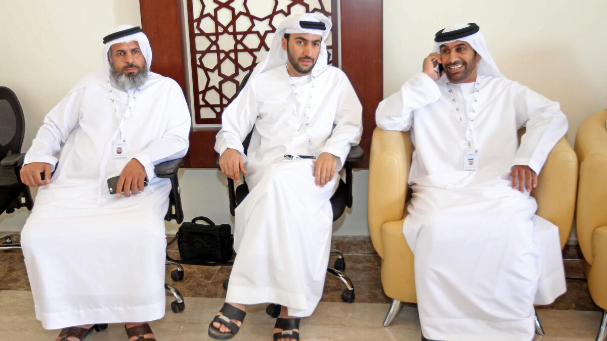 FNC candidates Matar Obaid Shabani, Mohammed bin Gashim and Mohammed Ali Saif at the polling station at the Sharjah Chess Club.
