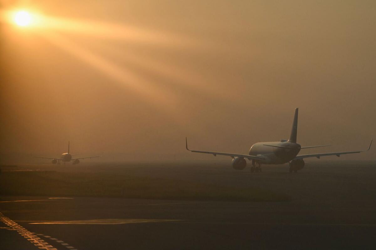 Aircraft line up to take off at Indira Gandhi International Airport in New Delhi . Photo: AFP