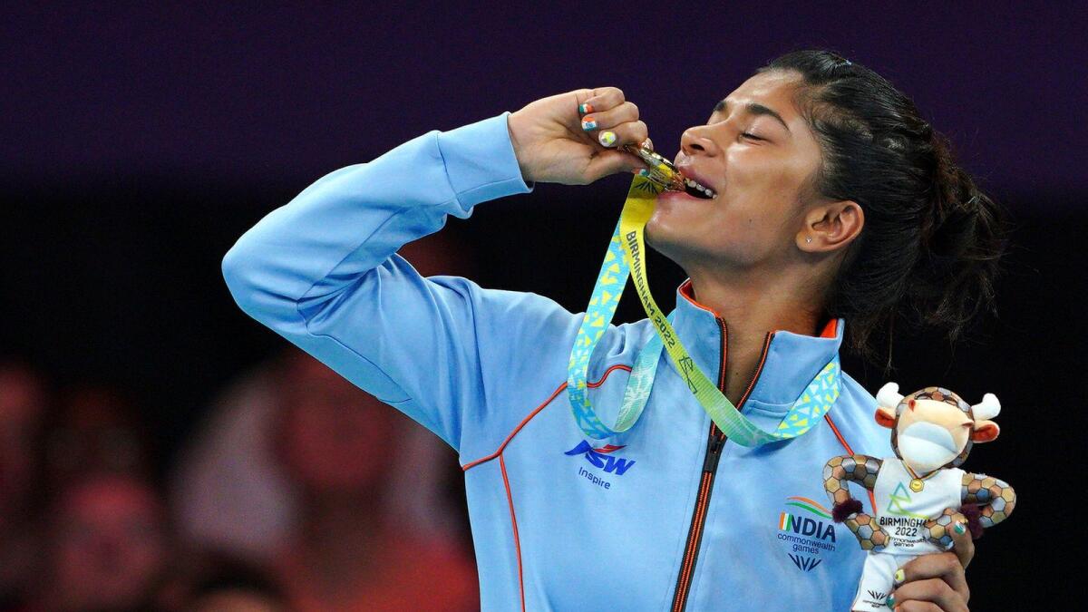 India's Nikhat Zareen celebrates her gold medal. — AP