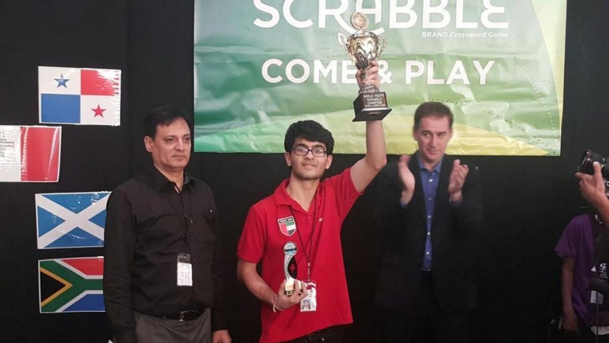 Sanchit receiving his trophy from Dave Brannan, Chairman - Mindsports International and Tariq Pervez, Chairman - Pakistan Scrabble Association
